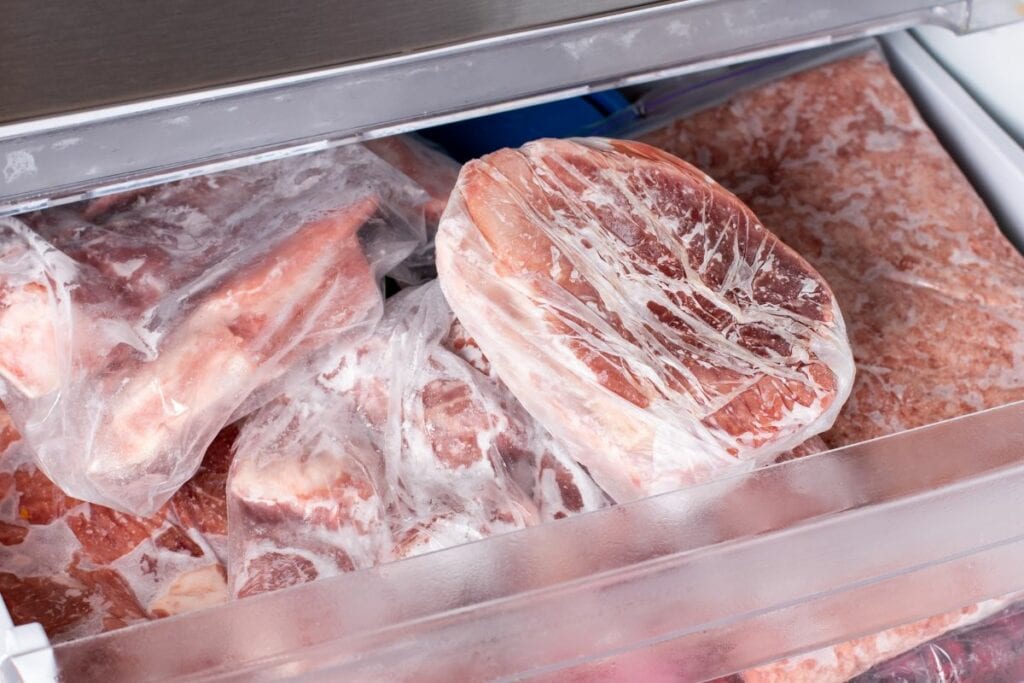 Raw Frozen Pork Chops in the Freezer